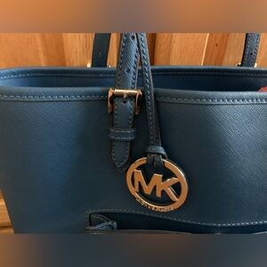 Michael Kor’s hard to find simple style and BEAUTIFUL powder royal blue.